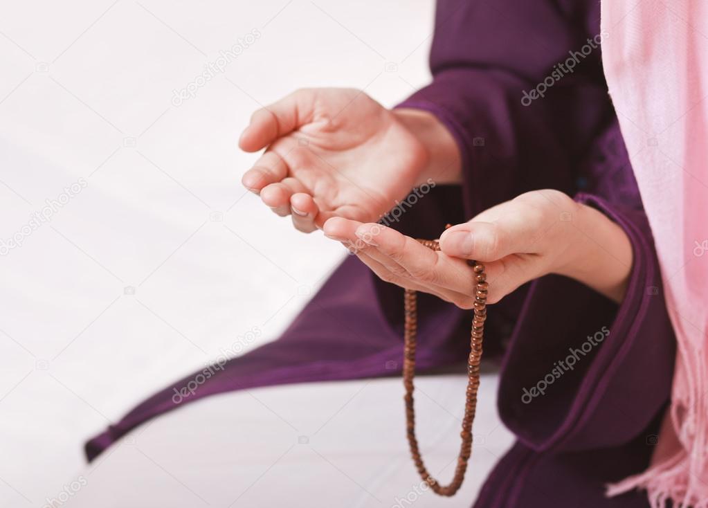 Muslim girl with rosary
