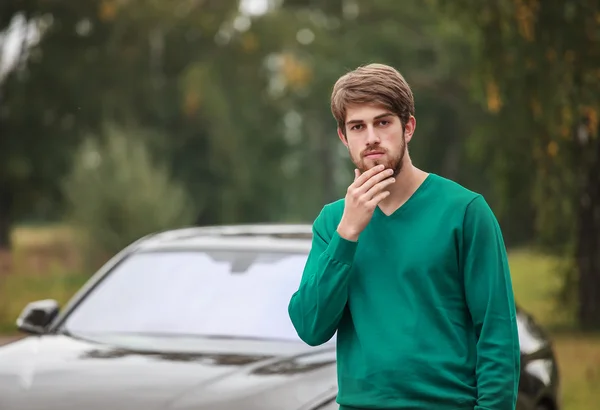 Handsome man with car — Stock Photo, Image