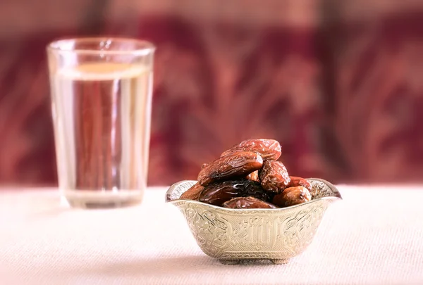 Date fruits in bowl — Stock Photo, Image