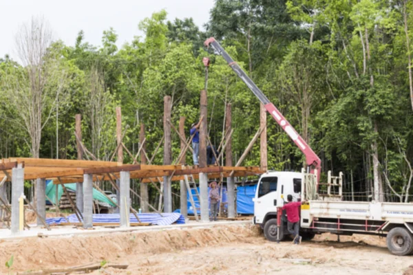 Place wood pillar by crane — Stock Photo, Image