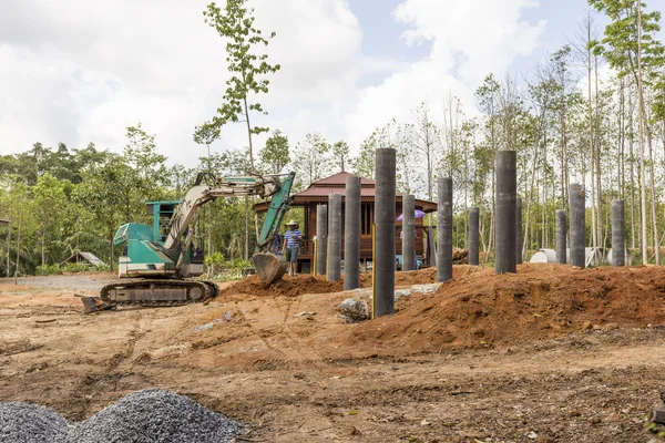 Excavator on new construction site — Stock Photo, Image