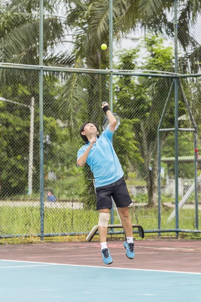 Tennis player in action — Stock Photo, Image