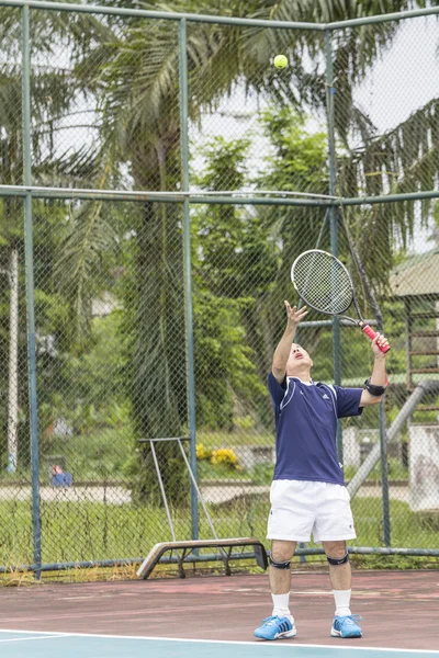 Tennis player in action — Stock Photo, Image