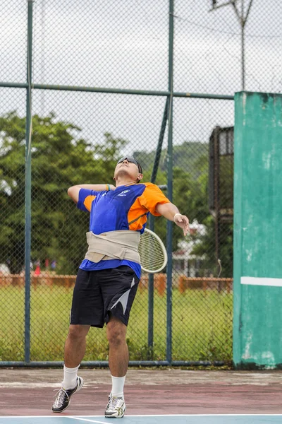 Tennis player in action — Stock Photo, Image