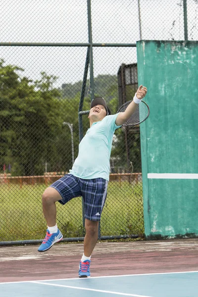 Tennis player in action — Stock Photo, Image