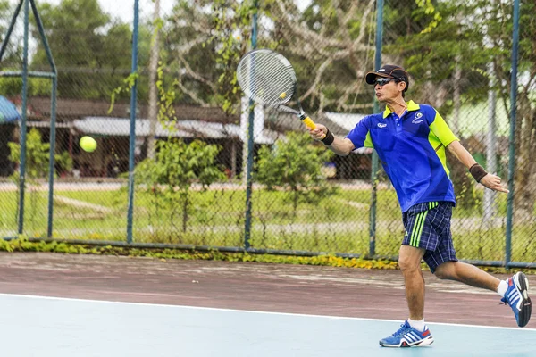 Tennis player in action — Stock Photo, Image