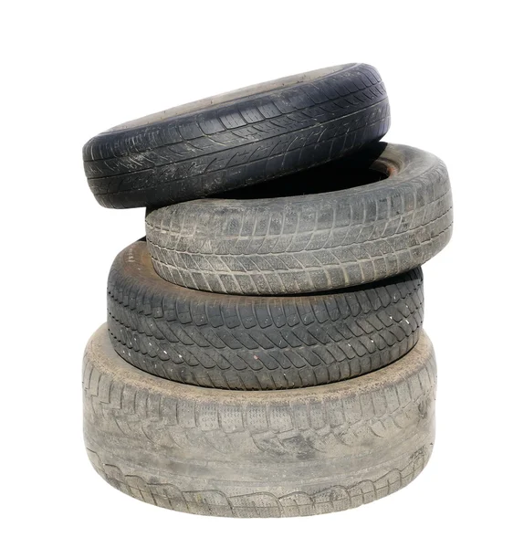 Old tires stacked, isolated on white background — Stock Photo, Image