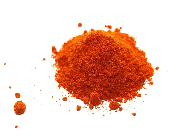 Heap of ground red paprika isolated on white background — Stock Photo, Image