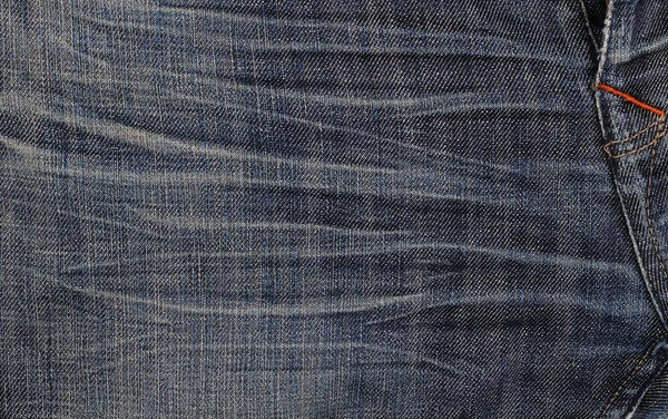 Dżinsy tkanina tło powierzchni, nowoczesne czyste denim struktura materiału — Zdjęcie stockowe