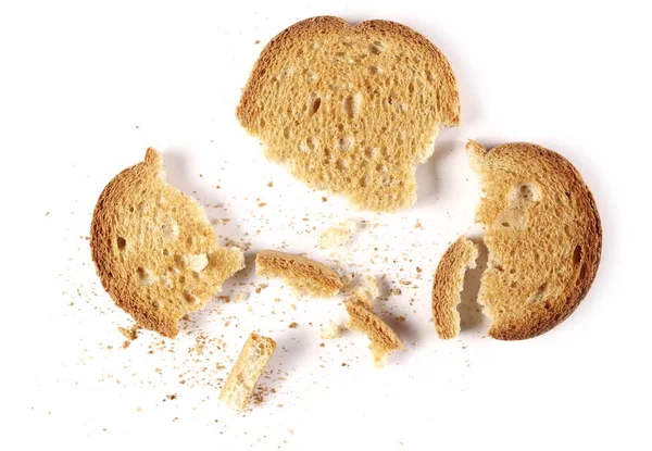 Rusk Quebrado Com Pilha Migalhas Torrada Trigo Inteiro Isolado Fundo — Fotografia de Stock