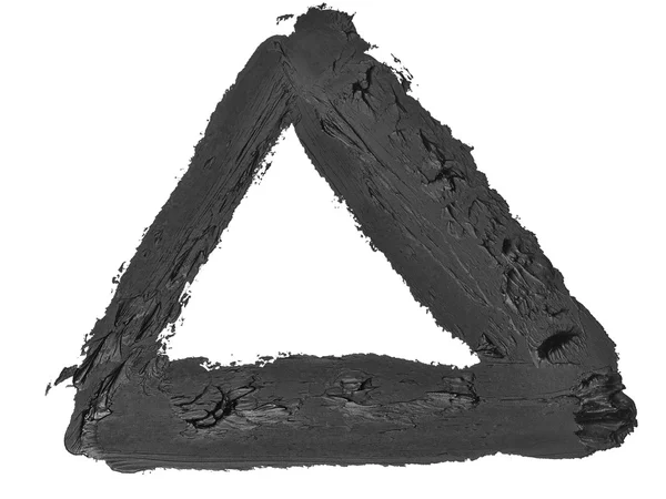 Foto triangolo nero pennellate grunge pittura ad olio isolato su sfondo bianco — Foto Stock