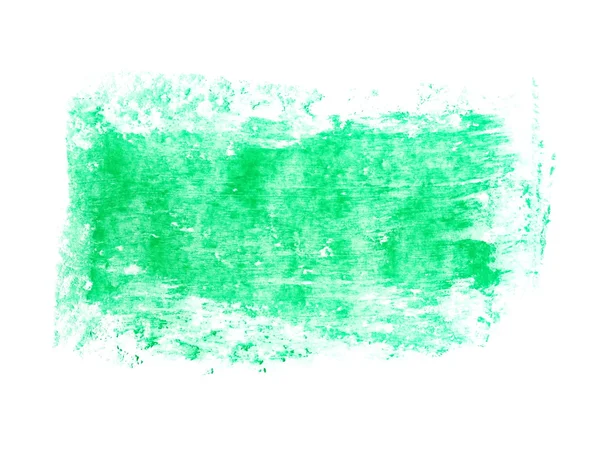 Foto grunge groene wax pastel crayon plek geïsoleerd op witte achtergrond — Stockfoto