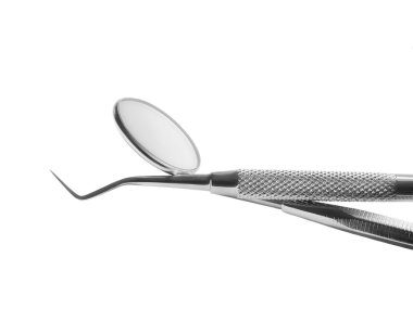 Diş ayna ve beyaz arka plan üzerinde izole prob