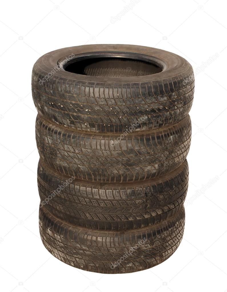 Old tires stacked, isolated on white background