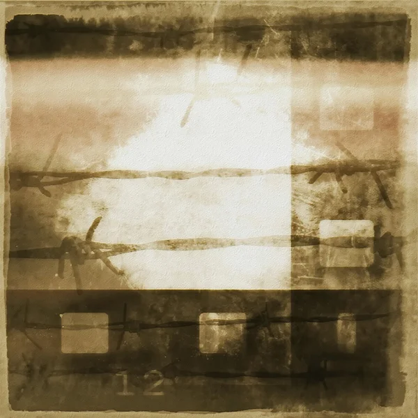 コンセプト グランジ フィルム ストリップの背景および有刺鉄線 — ストック写真