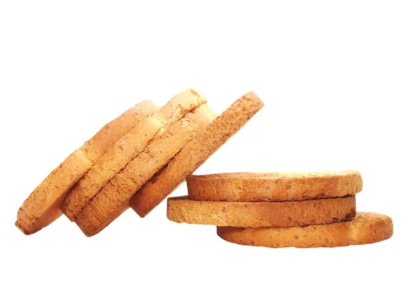 Pilha rusks com farinha de trigo integral, pão fatiado isolado, trigo integral pão rusk seco, pão integral isolado em fundo branco — Fotografia de Stock