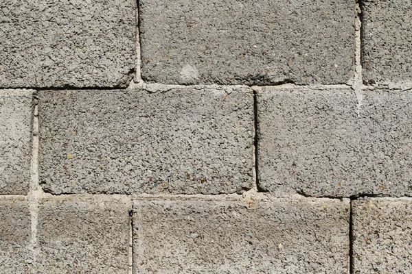 Szare tło ściana bloku żużlowego dla tła lub tekstury — Zdjęcie stockowe