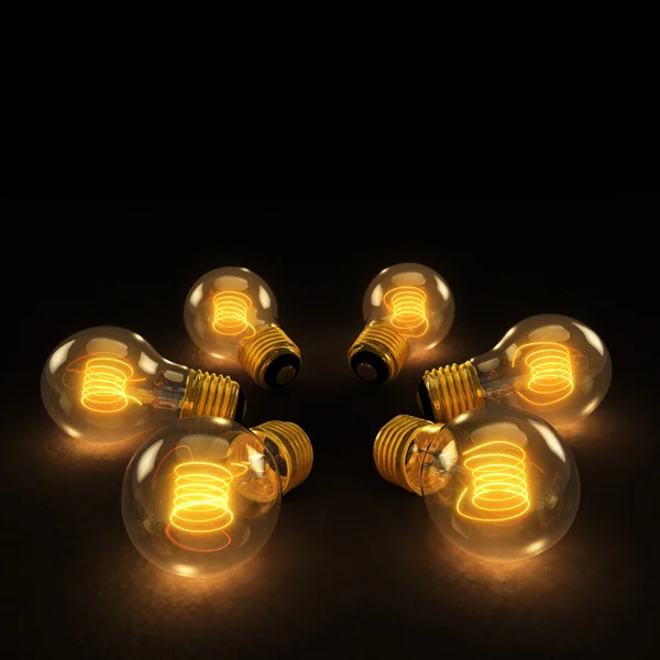 Six Incandescent Lightbulbs in a circle on dark background — Stock Photo, Image