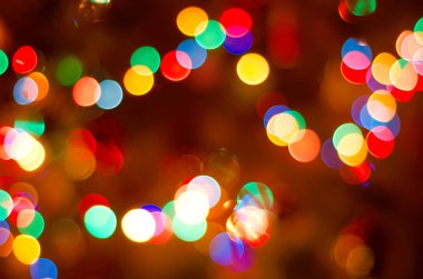 Bulanık çelenk ışıklarının soyut Noel arkaplanı