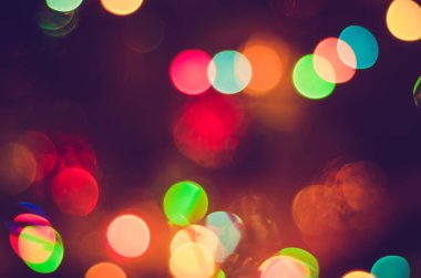 Bulanık çelenk ışıklarının soyut Noel arkaplanı