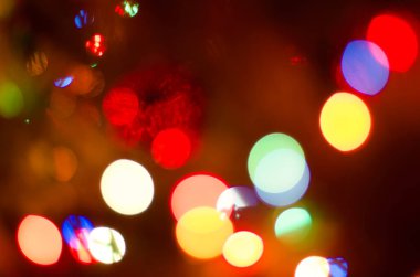 Bulanık çelenk ışıklarının soyut Noel arkaplanı