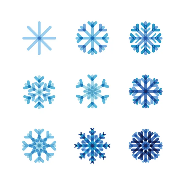 Conjunto de copos de nieve de tonos azules — Vector de stock