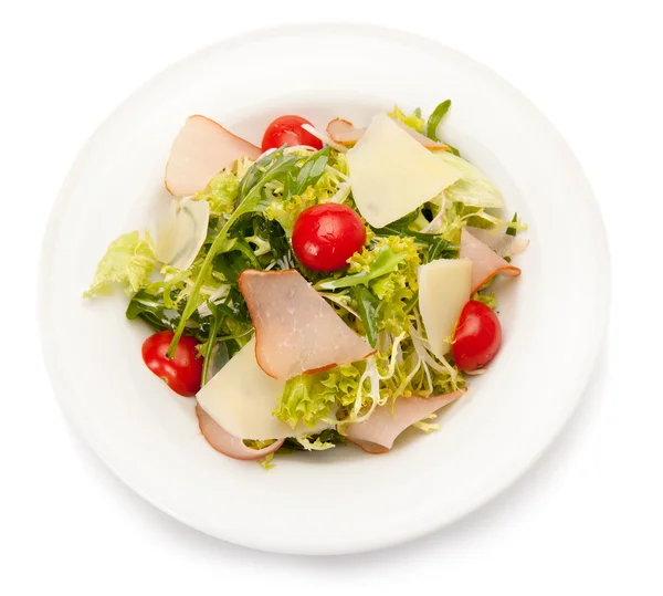 Sebze salatası jambon, kaşar peyniri ve domates ile.