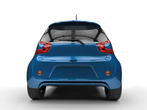 Donker blauwe compacte auto - glanzende verf - achteraanzicht — Stockfoto