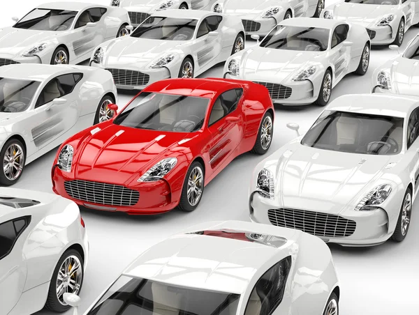 Stilvoller roter Sportwagen sticht in der Menge der generischen weißen Autos hervor — Stockfoto