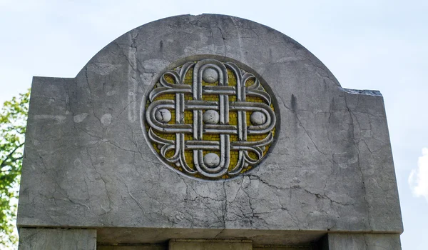 Símbolo de piedra circular fina en mosaico de piedra amarilla — Foto de Stock
