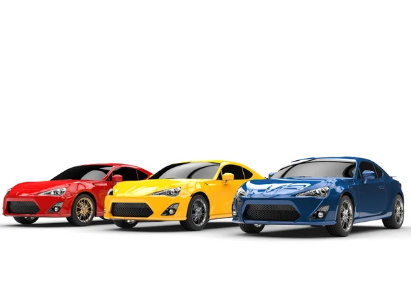 Carros genéricos cores vermelho, amarelo e azul — Fotografia de Stock
