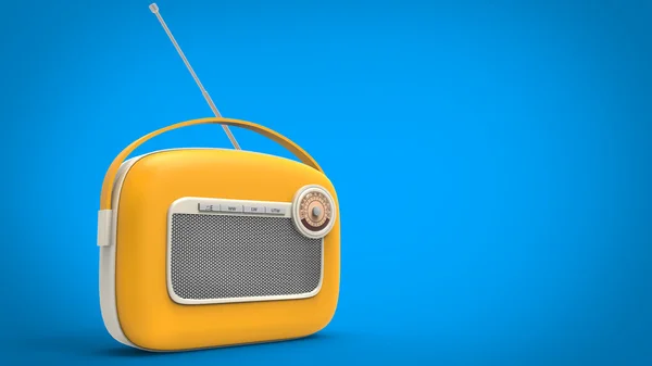 Yellow vintage radio on light blue background — Stock Photo, Image