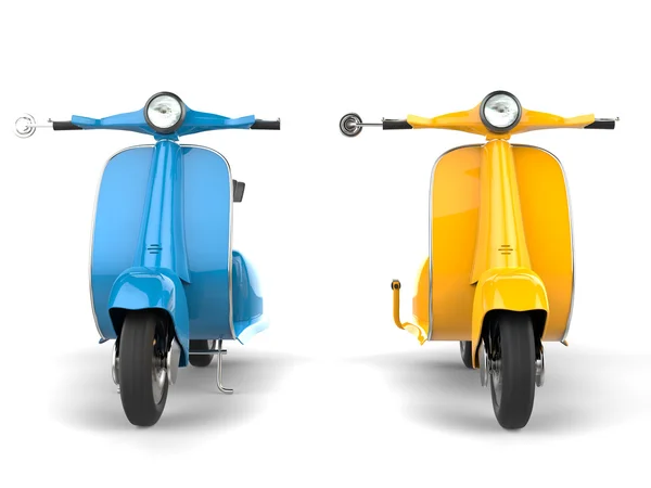 Azul - scooters amarelo lado a lado — Fotografia de Stock