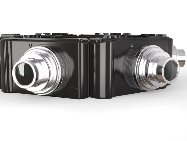 Câmeras digitais compactas modernas pretas com lente prateada — Fotografia de Stock