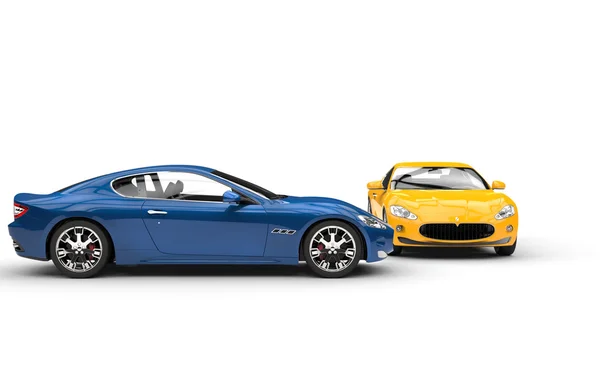 Blaue und gelbe Autos — Stockfoto