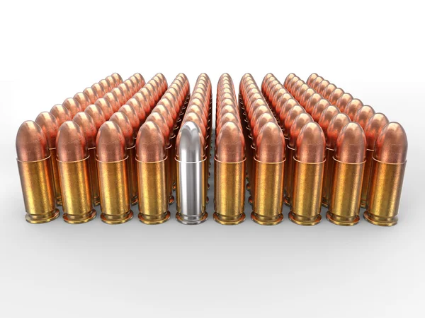 Silver bullet stands out in a pack of ammo — Stock Photo, Image