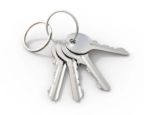 Set sleutels op een sleutelhanger op witte achtergrond — Stockfoto