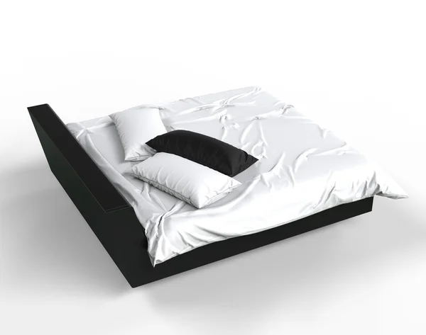 Modern bed with black and white pillows - top view — Stock Photo, Image