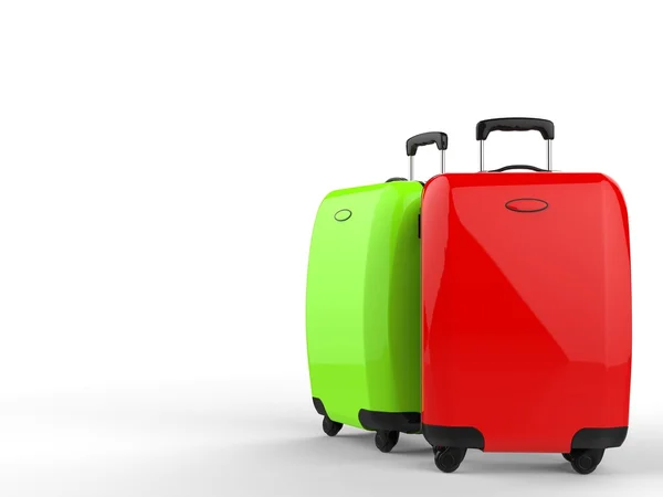 Yeşil ve kırmızı bavul — Stok fotoğraf