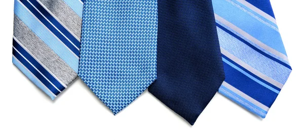 A group of blue neckties on a white background — Stock Photo, Image