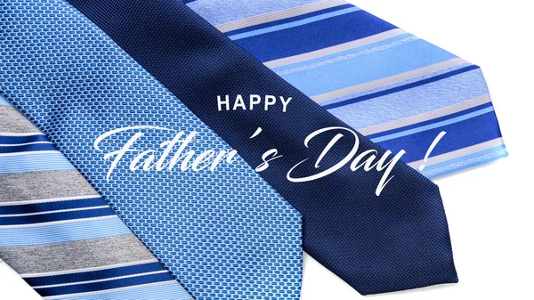 A group of blue mens neckties with Fathers Day greeting Royalty Free Stock Images