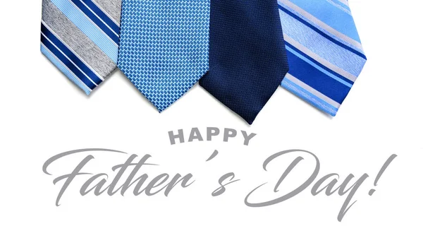 A group of blue mens neckties with Fathers Day greeting Royalty Free Stock Photos