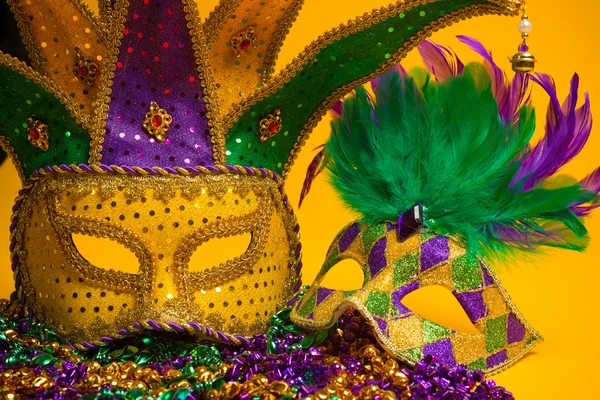 Colorful group of Mardi Gras or venetian mask or costumes on a y — Stock Photo, Image