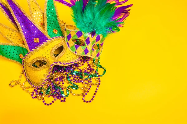 Mardi Gras Mask on yellow Background — Stock Photo, Image