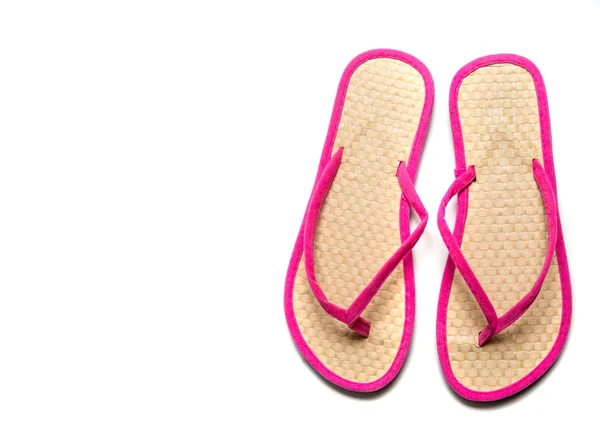 Flip-Flop-Sandalette aus rosa und Stroh auf weißem Hintergrund — Stockfoto