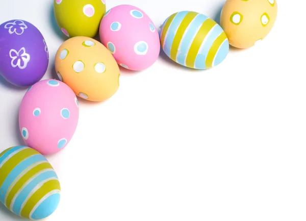 Painted Easter eggs with copy space on background — Stock Photo, Image