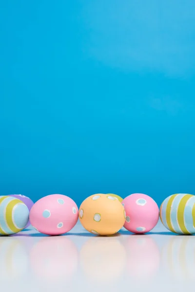 Painted Easter eggs with copy space on background — Stock Photo, Image