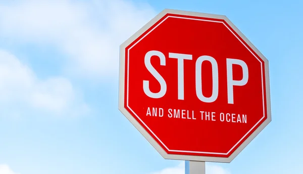 "Stop and smell the Ocean" traffic sign in southern California — Stock Photo, Image