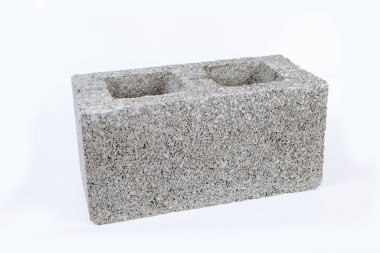 Beyaz arka planda genişletilmiş kil çimento gri blok. İnşaat teması