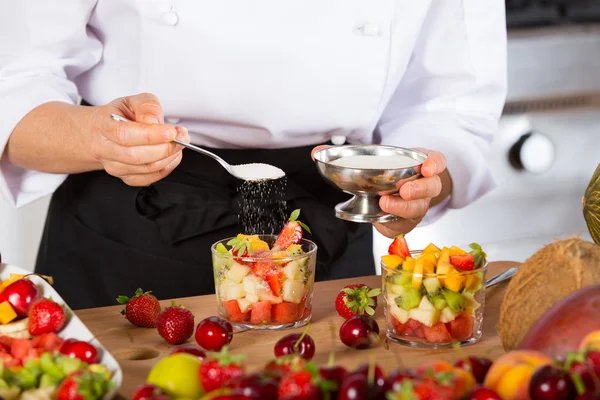 Chef with fruits — Stock Photo, Image